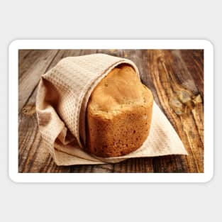 Homemade bread on a wooden board Sticker